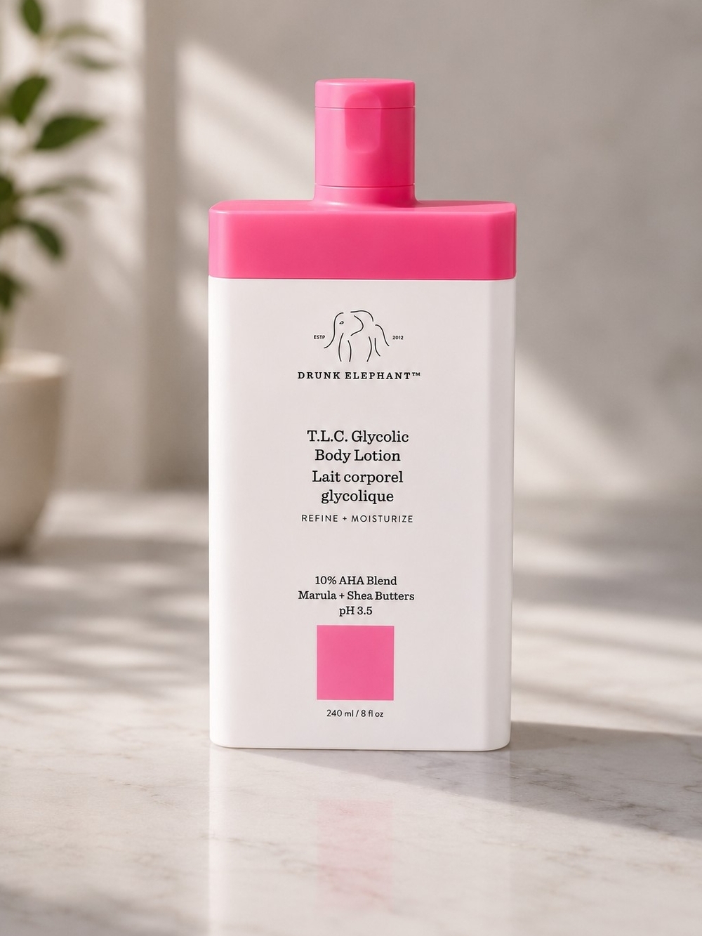 Drunk Elephant White Bottle with Pink Cap Body Lotion